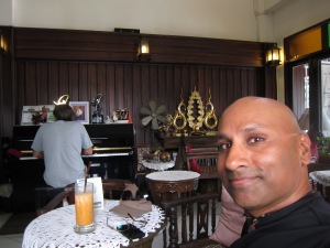 Having a Thai iced tea while listening to this guy playing the piano. He was pretty good!
